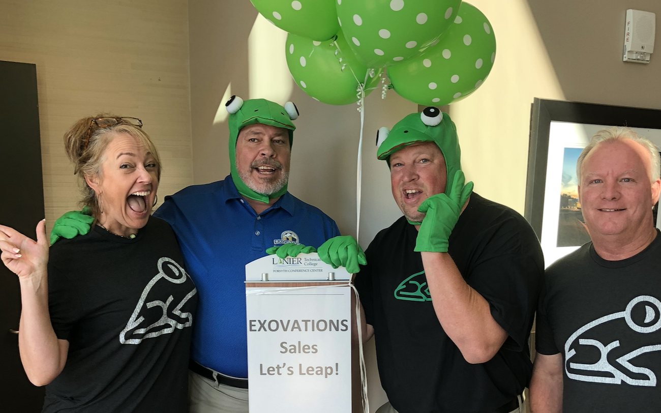 The EXOVATIONS sales team at a kickoff meeting themed Let us Leap
